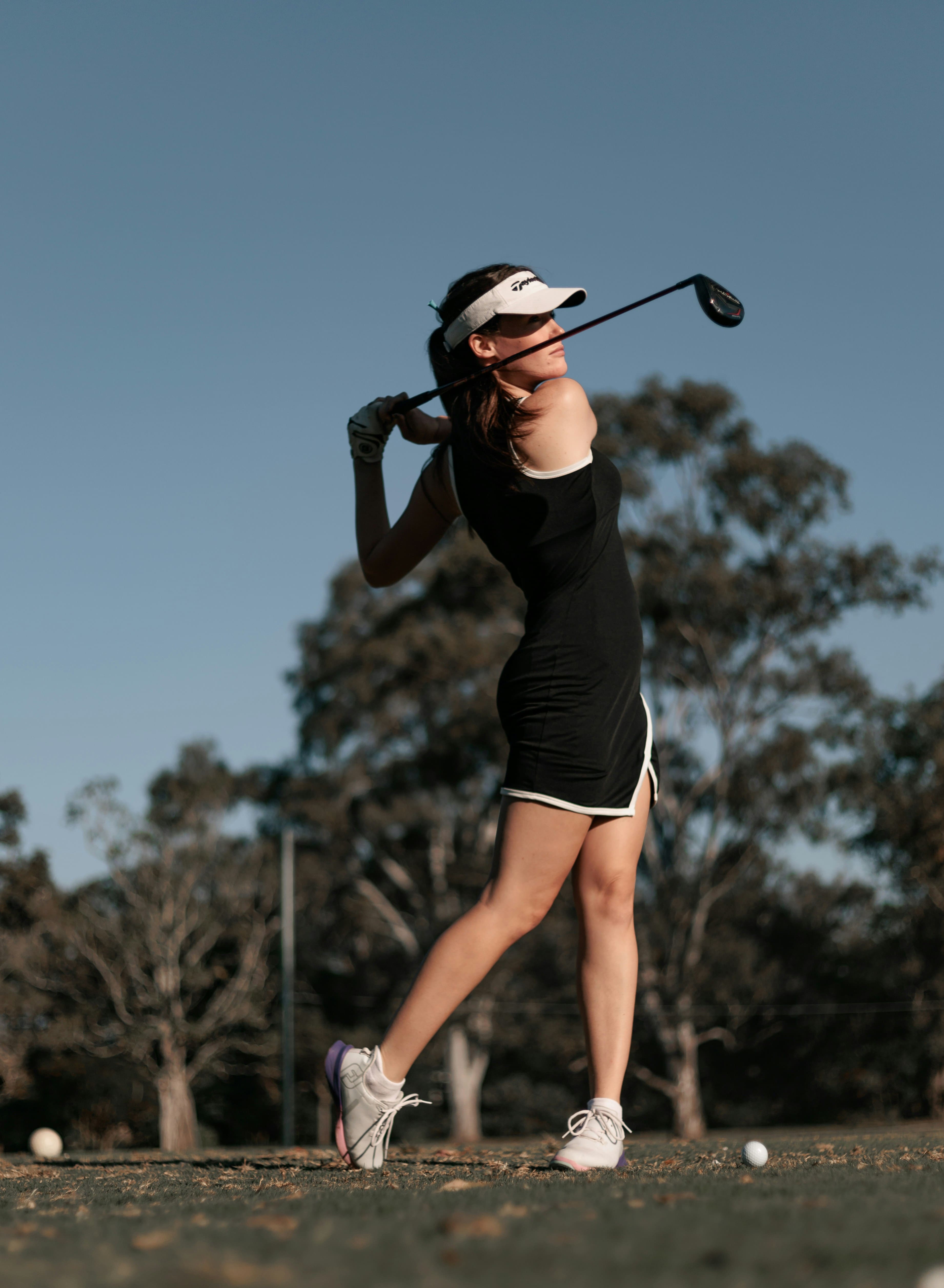 Golfer full swing follow-through